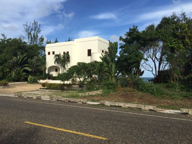 our-lot-and-white-home-to-left-of-it